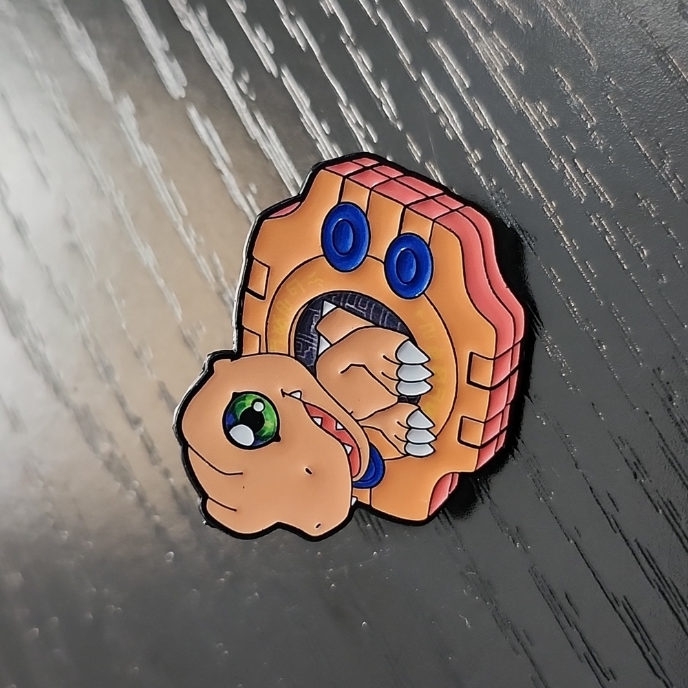 Agumon Enamel Pin from the Digimon Adventure Series